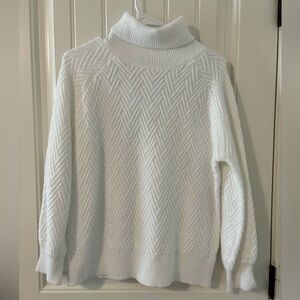 white turtle neck sweater